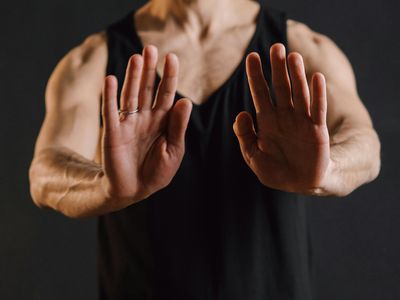 Detail of a woman's hands in a meditative mudra